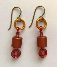 Earrings Orange cylinder by Carolyn Henderson