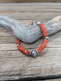 Bracelet: faceted red coral by Myra Gadson