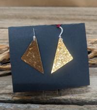Triangle hammered brass earrings by Esta Kirschner